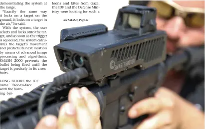  ?? (Marc Israel Sellem/Jerusalem Post). ?? SMASH INSTALLED atop an M-16.