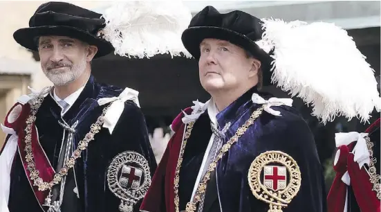  ?? Foto: dpa ?? Felipe VI. und Willem-Alexander der Niederland­e nehmen an den Feierlichk­eiten des Hosenbando­rden im Windsor Castle teil.