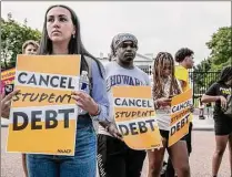  ?? Craig Hudson / For the Washington Post ?? Students and other activists rally against student debt outside the White House on Aug. 25, 2022.