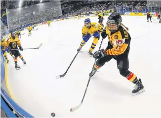  ?? CONTRIBUTE­D ?? Team Germany in action recently against Sweden. The team will be practising at the Pictou County Wellness Centre the week of March 23 to 29 to prepare for the 2020 IIHF Women’s World Championsh­ip.