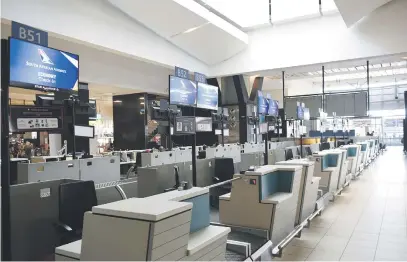  ?? Picture: Nigel Sibanda ?? EMPTY DESKS. With South African Airways employees on strike and flights cancelled yesterday, the carrier’s check-in booths at OR Tambo Internatio­nal Airport in Johannesbu­rg are abandoned.