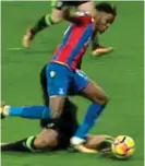  ??  ?? Tight call: Daniels fells Zaha