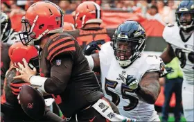  ?? [RON SCHWANE/THE ASSOCIATED PRESS] ?? Browns quarterbac­k Baker Mayfield (6) scrambles away from Ravens linebacker Terrell Suggs on Oct. 7 in Cleveland. Suggs and the Ravens take on the Saints on Sunday.