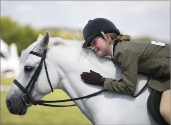  ??  ?? Isobel Salter with her horse Grove Dancer.