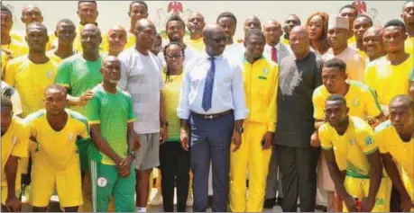  ??  ?? Edo State Governor, Mr. Godwin Obaseki, with members of the triumphant Bendel Insurance Football Club, and officials of the state government, during the team’s visit to the governor at Government House in Benin City…yesterday