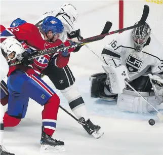  ?? PIERRE OBENDRAUF ?? Canadiens forward Artturi Lehkonen tries to push his way past Los Angeles Kings defenceman Derek Forbort for a rebound in front of goaltender Jack Campbell Thursday during the Kings’ 3-0 victory.
