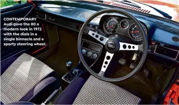  ?? ?? CONTEMPORA­RY Audi gave the 80 a modern look in 1972 with the dials in a single binnacle and a sporty steering wheel