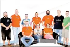  ?? Photo Submitted ?? Volunteers from local Lowe’s stores renovated a former storage room at the Bella Vista Boys & Girls Club into a new teen hangout. Pictured are (seated) Scott Johnson, Bentonvill­e; Katy Petersen, Bentonvill­e HR; Ashley McCarthy, Rogers; (standing) Shawn...