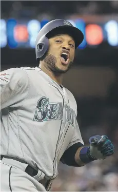  ?? MIKE EHRMANN/GETTY IMAGES ?? Robinson Cano reacts after hitting the winning home run in the 10th inning for the American League all-stars as they defeated the National League on Tuesday at Marlins Park in Miami.