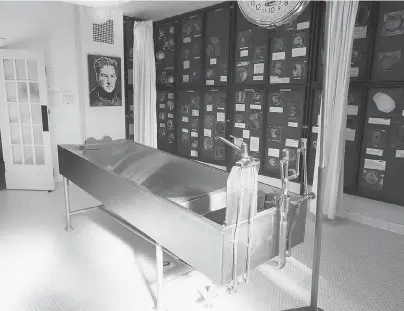  ?? JOHN MORSTAD FOR NATIONAL POST) ?? An autopsy bench in the Vancouver Police Museum, a formerly functionin­g autopsy facility. In 1959 an autopsy was performed on Errol Flynn on this table and his body was placed into the adjacent morgue before being sent back to California.