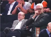  ?? Associated Press ?? Phil Jackson, right, ‘mutually agreed’ with New York Knicks owner Jim Dolan to leave his job as Knicks president on Wednesday. Jackson has two years remaining on his contract.