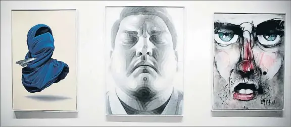  ?? MARKUS SCHREIBER / AP ?? Shirt Mask x Paper Plane (Nuno Viegas), The Fighter (El Mac) y Street Face (Anthony Lister), en la muestra