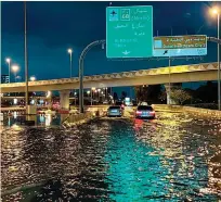  ?? AFP PHOTO ?? UNUSUAL WEATHER
Motorists drive on a flooded street following heavy rains in the city of Dubai, United Arab Emirates, on Wednesday, April 17, 2024.