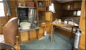  ??  ?? Time capsule: The kitchen still contains food tins from the 1930s and a tea urn