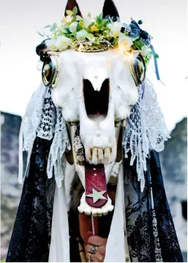  ??  ?? A highly decorated horse skull complete with leather ears and tongue.