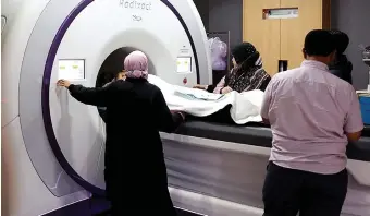  ?? ?? A cancer patient undergoing treatment via tomotherap­y at the Radiothera­py and Oncology Department of Hospital Kuala Lumpur.