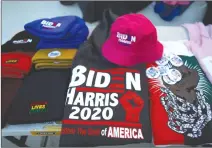  ?? Associated Press photo ?? A street vendor sells Biden-Harris merchandis­e ahead of President-elect Joe Biden’s and Vice President-elect Pamela Harris} inaugurati­on ceremony, Tuesday in Washington.