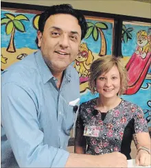  ?? PAUL FORSYTH
METROLAND ?? Dr. Omer Shaikh, a pediatrici­an with Niagara Health, is shown with registered nurse Cassie Storace at the St. Catharines hospital.