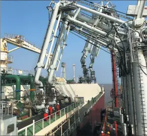  ?? XU CONGJUN / FOR CHINA DAILY ?? An LNG ship from Qatar unloads fuel at Yangkou port of Nantong, East China’s Jiangsu province.