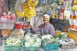  ??  ?? Omprakash Yadav, Radha Yadav’s father, at his grocery-and-vegetable shop in Mumbai.
PRAMOD THAKUR/HT