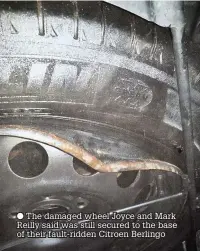  ??  ?? ● The damaged wheel Joyce and Mark Reilly said was still secured to the base of their fault-ridden Citroen Berlingo