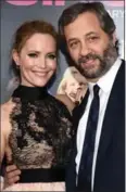 ?? GETTY ?? Producer Judd Apatow and his wife, actress Leslie Mann.