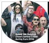  ??  ?? GAME ON Rebekah cheers behind Coleen during Euro 2016