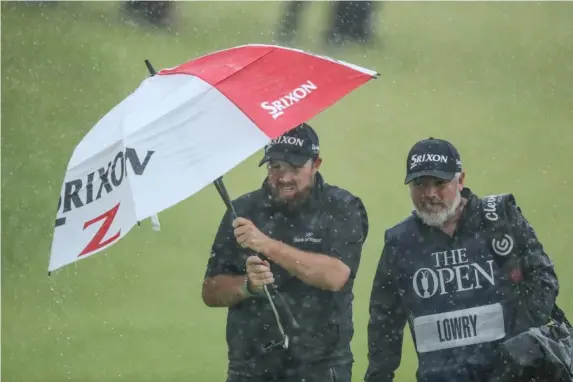  ?? (Getty) ?? The Irishman held his nerve amid torrential rain to win by six strokes