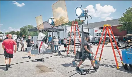  ?? Photograph­s from Tyler Perry Studios ?? “SISTAS” recently shot for two weeks at Tyler Perry’s Atlanta studio, a former Army base, with masks and distancing required on-set.
