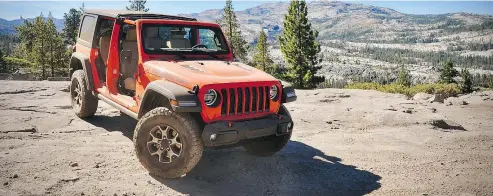  ?? DEREK MCNAUGHTON/DRIVING ?? The 2018 Rubicon kept moving forward, upward and over all obstacles on the Rubicon Trail.