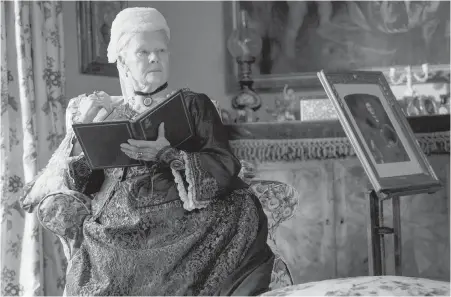  ??  ?? Judi Dench in a scene from Victoria and Abdul, in which she reprises the role of Queen Victoria that she played 20 years ago in Mrs. Brown.