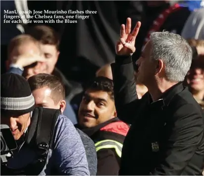  ??  ?? ManU coach Jose Mourinho flashes three fingers at the Chelsea fans, one finger for each title won with the Blues