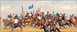  ?? Images from IFC Films ?? RIDERS converge in a scene from the film “Lakota Nation vs. United States.”