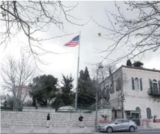  ?? — Reuters ?? An American flag flutters at the premises of the former United States Consulate General in Jerusalem on Monday.