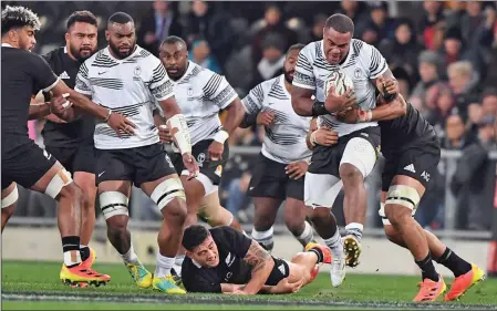  ??  ?? Flying Fijians looseman John Dyer on the attack against the All Blacks in Dunedin, last Saturday. Photo: Otago Daily Times