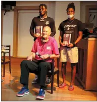  ??  ?? Arif Khatib with Arkansas Baptist College student athletes Enrique Quinones III and Dashawntre­as “Vonti” Jones after the movie viewing