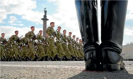  ?? AP ?? Russian troops march during a rehearsal yesterday for today’s Victory Day military parade in St Petersburg.