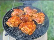 ?? GRETCHEN MCKAY — PITTSBURGH POST-GAZETTE/TNS ?? Korean gochujang hot sauce gives this barbecued chicken a spicy-sweet kick.