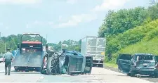  ?? PENNSYLVAN­IA STATE POLICE ?? Pennsylvan­ia is enforcing tougher penalties for drivers who fail to move over for disabled vehicles and first responders. A state trooper was injured in this July crash when an SUV slammed into his unmarked vehicle as the trooper assisted a disabled tractor-trailer.
