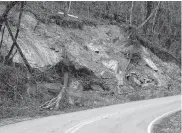  ?? STAFF FILE PHOTO BY DOUG STRICKLAND ?? A mudslide along the shoulder of Nickajack Road in Walker County, Ga., leading up Lookout Mountain is seen in 2015.