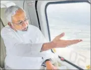  ?? SANTOSH KUMAR/HT PHOTO ?? Chief minister Nitish Kumar conducts an aerial survey of the affected areas on Tuesday.