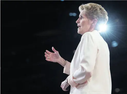  ?? DARREN CALABRESE / THE CANADIAN PRESS ?? Ontario Premier Kathleen Wynne launched “an extraordin­ary blitz of invective” against Doug Ford.