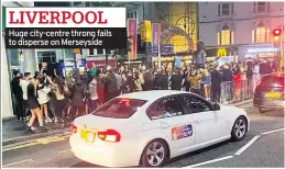  ??  ?? LIVERPOOL Huge city-centre throng fails to disperse on Merseyside