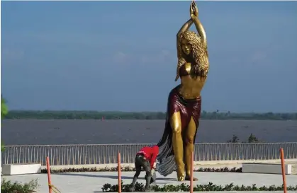  ?? Photograph: AFP/Getty Images ?? The huge statue captures Shakira making her trademark hip swivel.