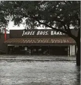  ?? Katrina Kidder ?? Three Brothers Bakery is no stranger to flooding. Yet its owners are perhaps weary but not bitter.