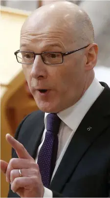  ??  ?? ‘Climb down’: Education Secretary John Swinney