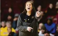  ?? Carlos Gonzalez / Associated Press ?? Minnesota coach Lindsay Whalen shouts from the sideline during the second quarter against Western Illinois on Nov. 7 in Minneapoli­s. Whalen will be inducted into the Women’s Basketball Hall of Fame in the spring.