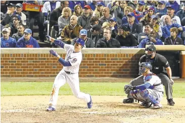 ?? DYLAN BUELL/GETTY IMAGES ?? Cubs first baseman Anthony Rizzo watches his home run sail into the right-field seats in the fifth inning of Game 6.