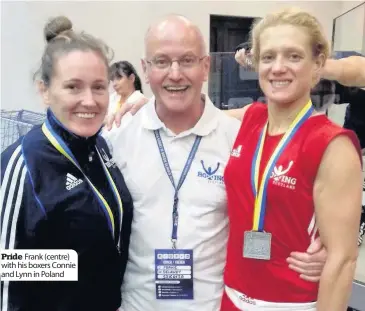  ??  ?? Pride Frank (centre) with his boxers Connie and Lynn in Poland