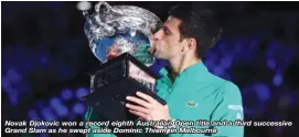  ??  ?? Novak Djokovic won a record eighth Australian Open title and a third successive Grand Slam as he swept aside Dominic Thiem in Melbourne